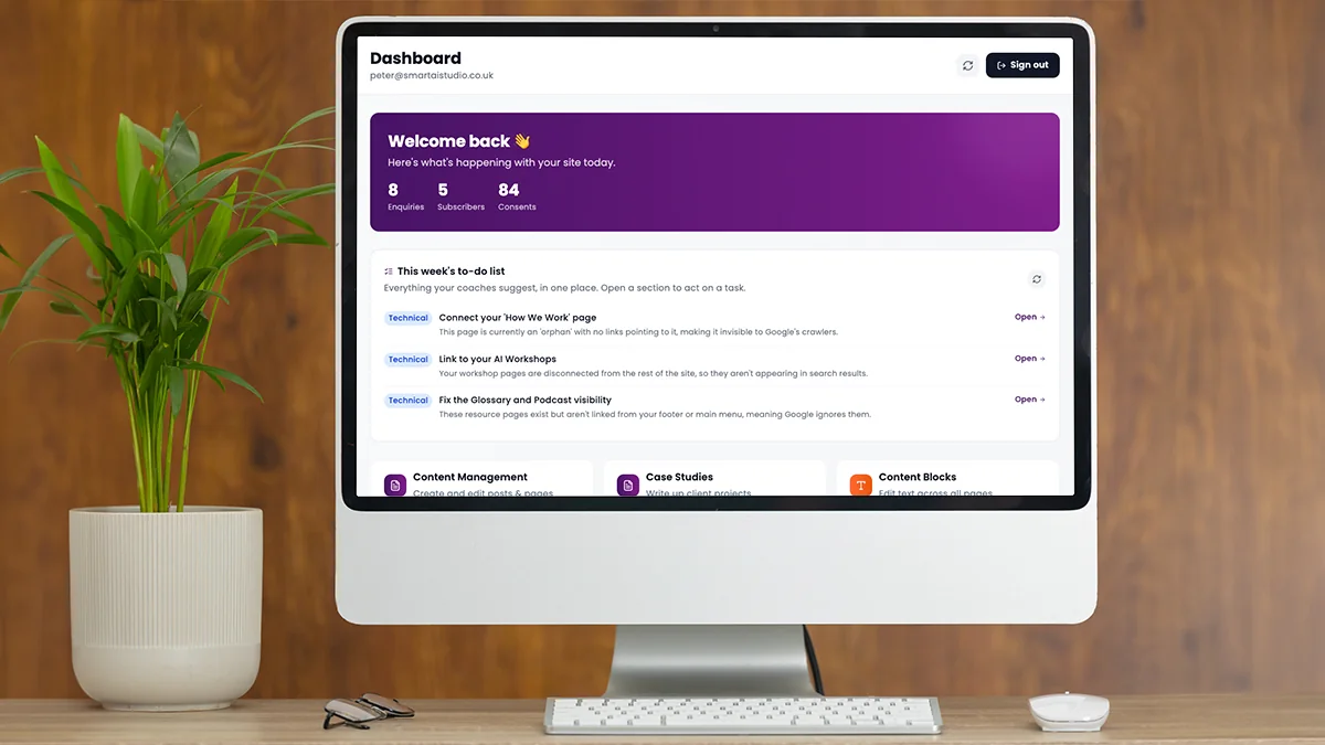 Smart AI Studio content and SEO management dashboard displayed on a desktop monitor